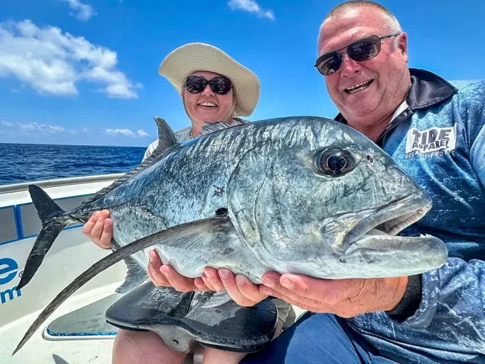 Couple fishing on romantic getaway with Ocean Blue Fishing