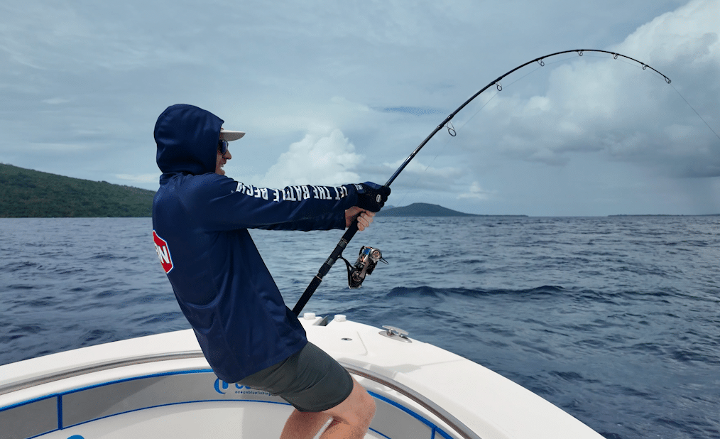 Angler battling after hooking up a Giant Trevally in Vanuatu waters