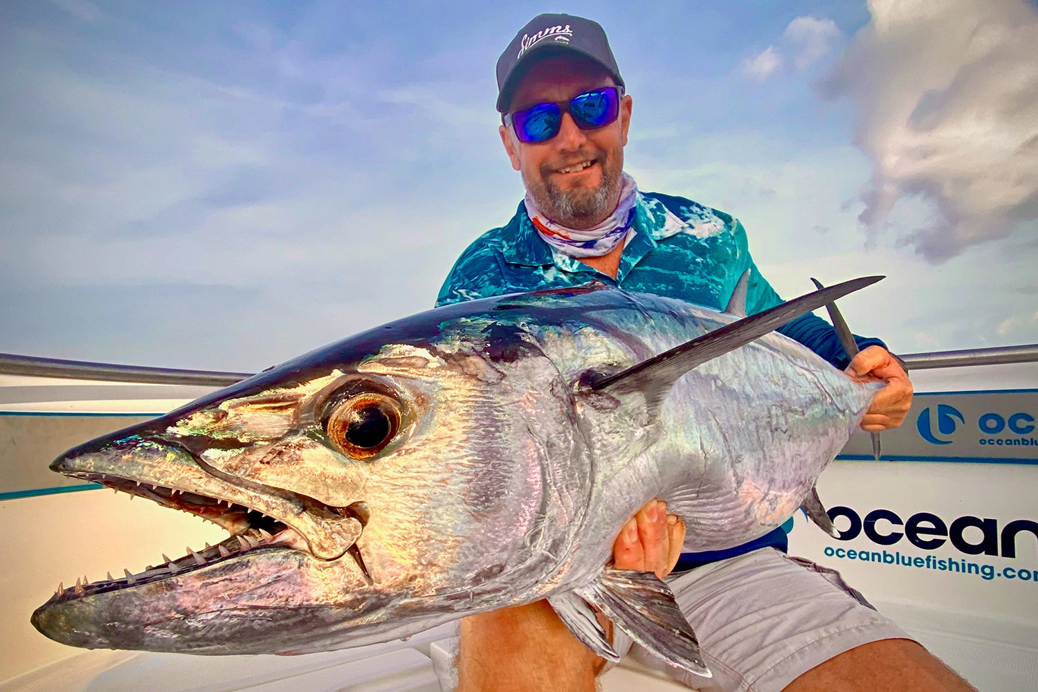 ocean blue fishing catch dogtooth tuna