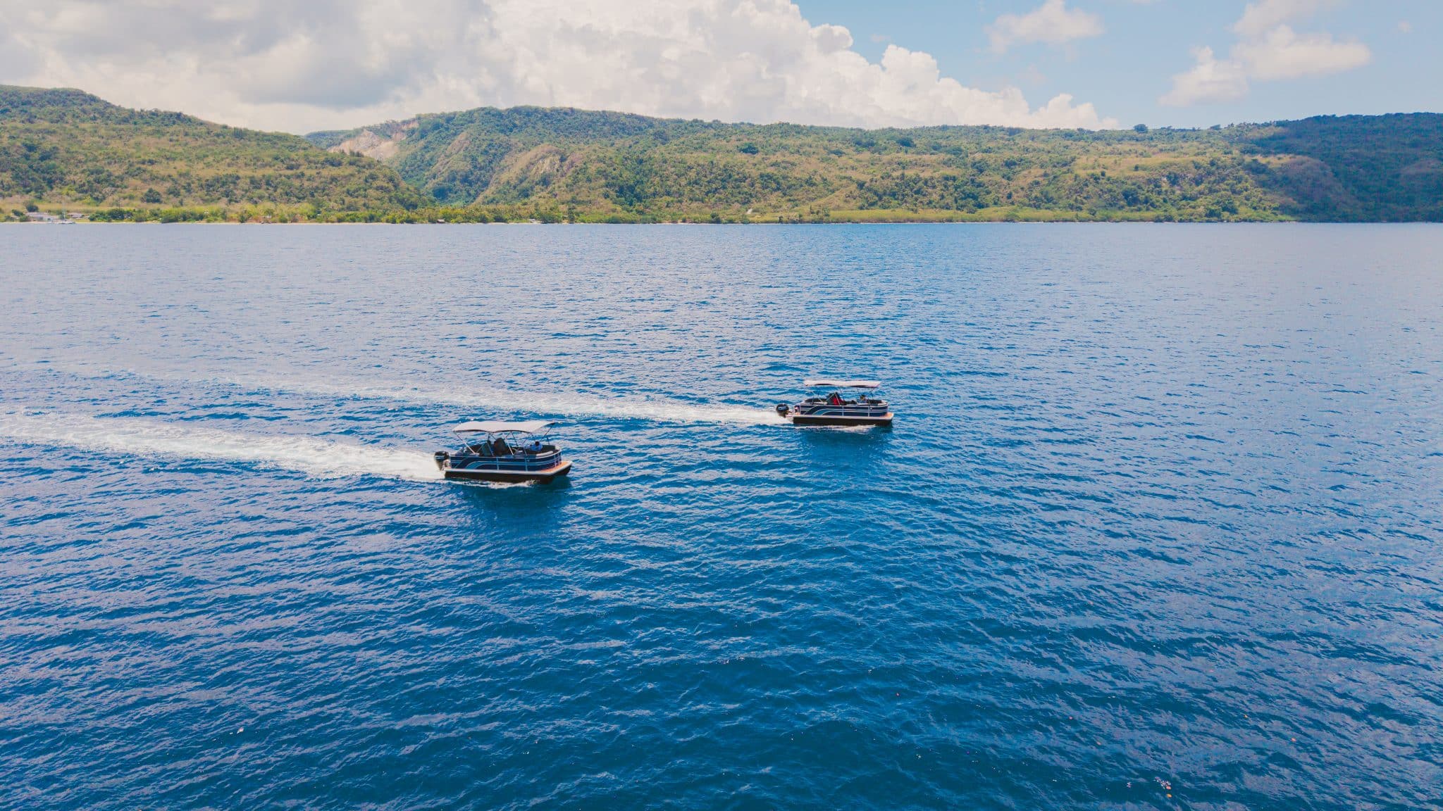 Private pontoon boats for fishing snorkelling and exploring reefs in Vanuatu with Ocean Blue Fishing